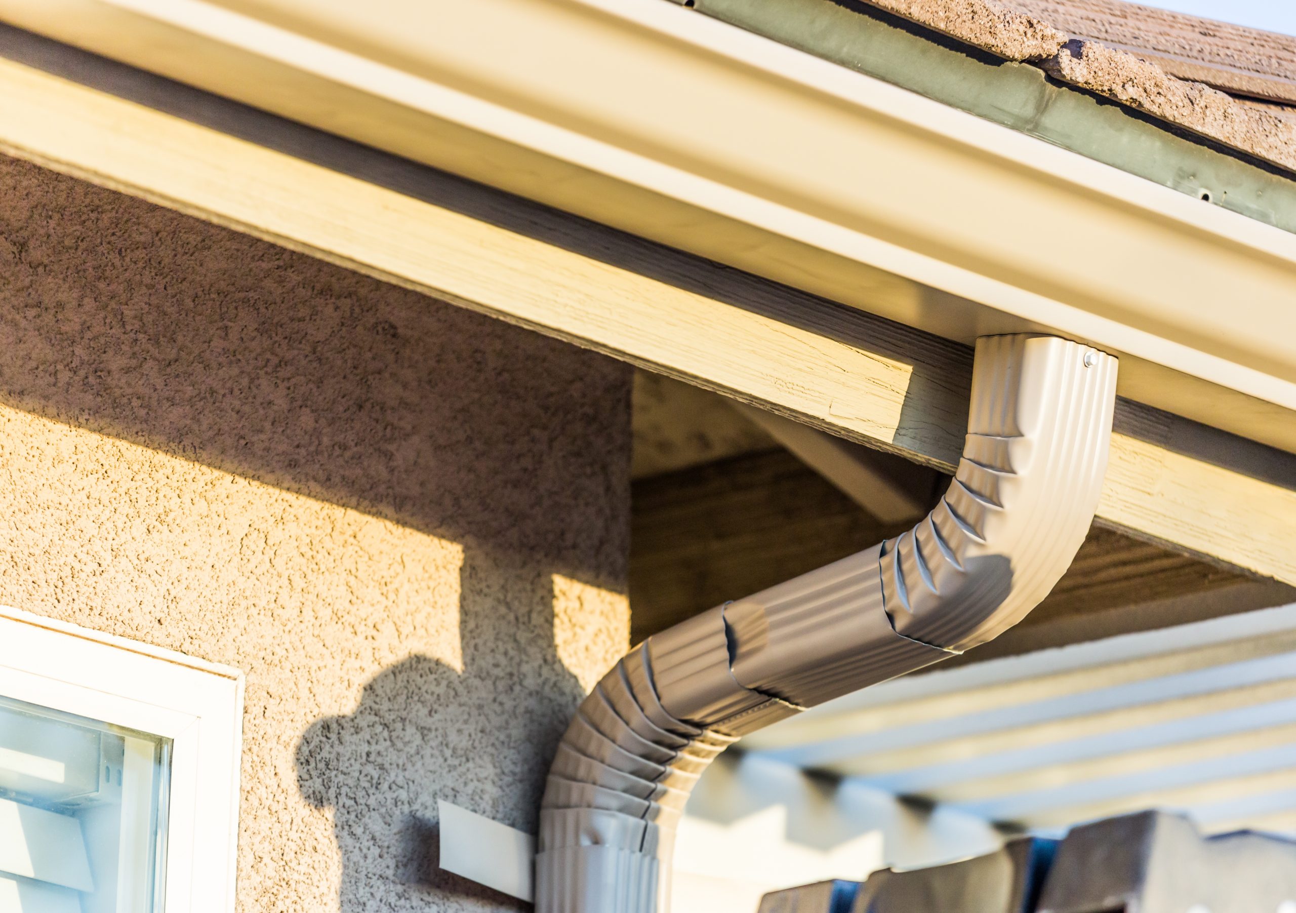 House with New Seamless Aluminum Rain Gutters.