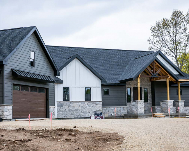 Mastic Board & Batten Siding (Color Brunswick) Prairie Exteriors and